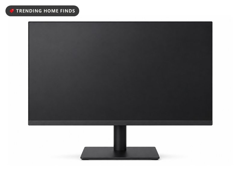 A flat dark gray 24.5 inch gaming monitor with thin bezels on a matte black height adjustable stand.