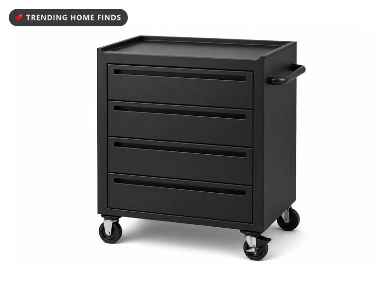 A black four drawer rolling steel tool cabinet with a top tray, a side handle and caster wheels.