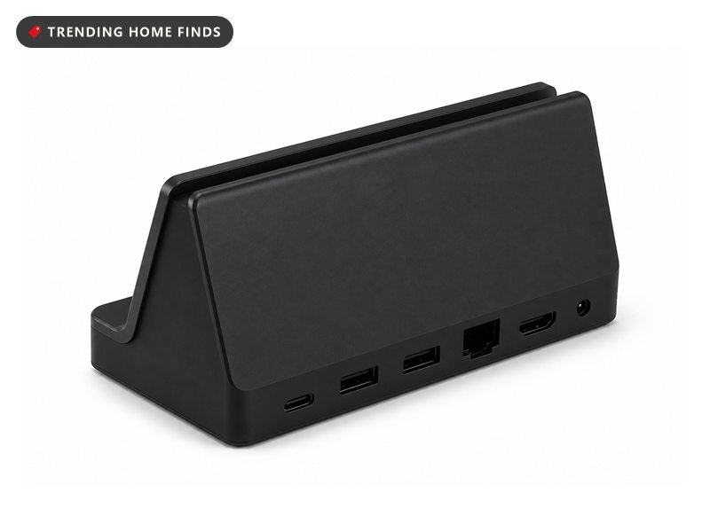 A small black angled docking station with a slot along its top and plain ports along its back.
