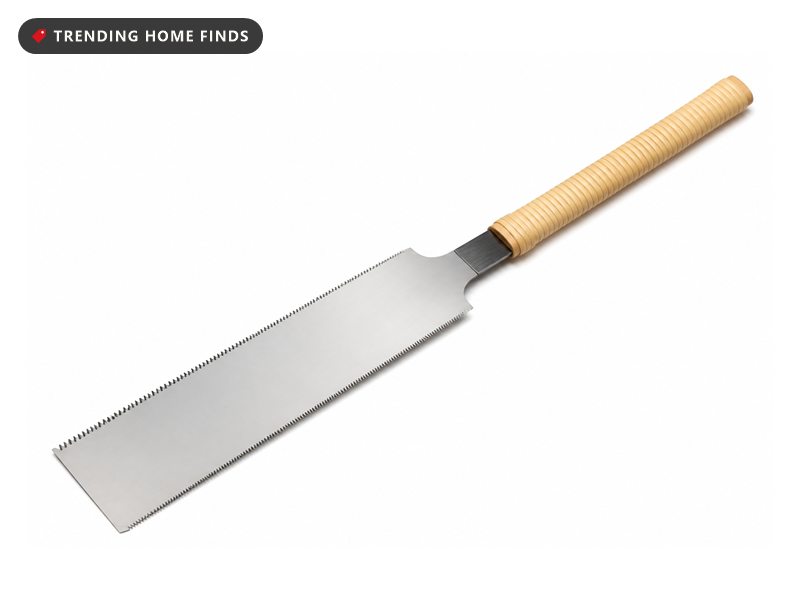 A Japanese double edge pull saw with a long thin steel blade and a straight cane wrapped handle.