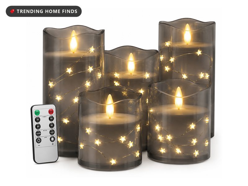 Five grey glass flameless pillar candles of different heights with flickering LED flames, fairy light strands inside, and a handheld remote