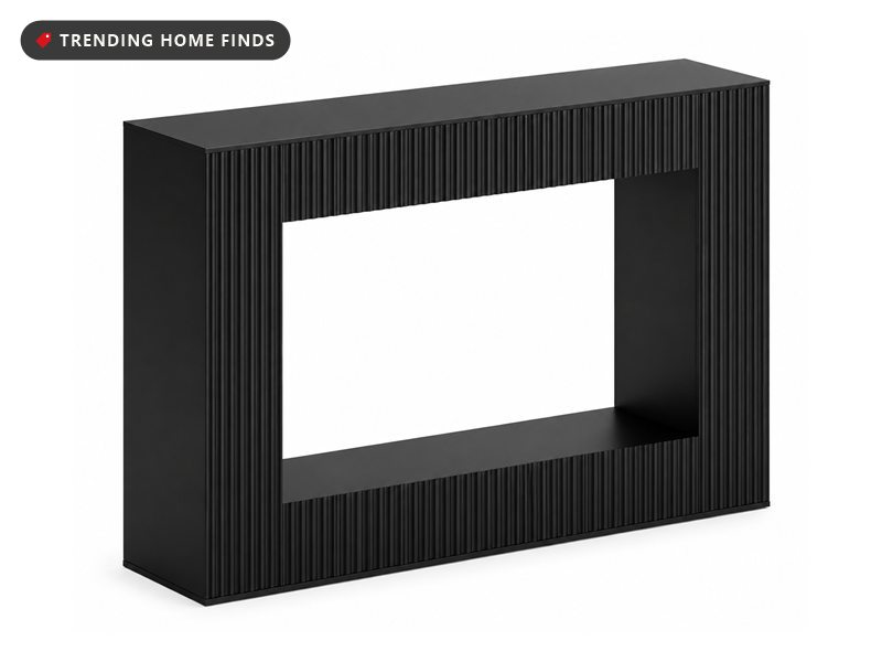 Narrow rectangular console table in matte black with vertical fluted panels and an open centre shelf