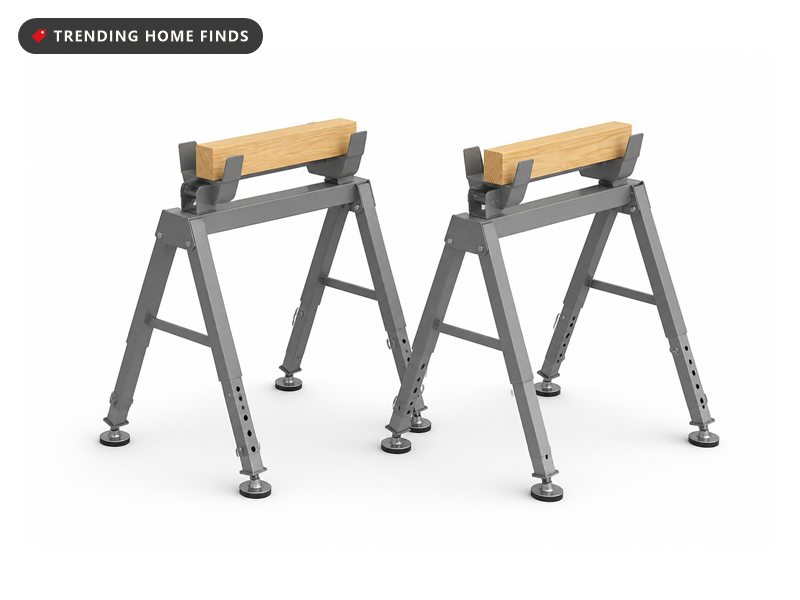 Two folding gray steel sawhorses with telescopic legs, swivel feet and support arms cradling short lengths of 2x4.