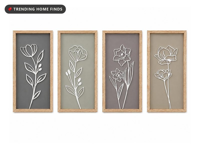 Set of four tall light wood frames, each with a raised white line-drawn flower on a grey, sage, mauve, or tan background