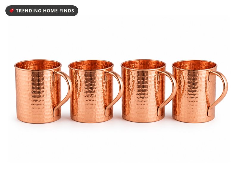 Four straight sided hammered copper mugs with sturdy copper handles.