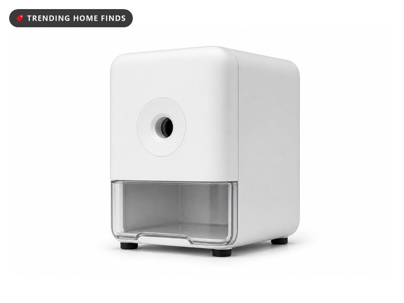A compact heavy duty electric pencil sharpener with an unbranded body and a shavings drawer.
