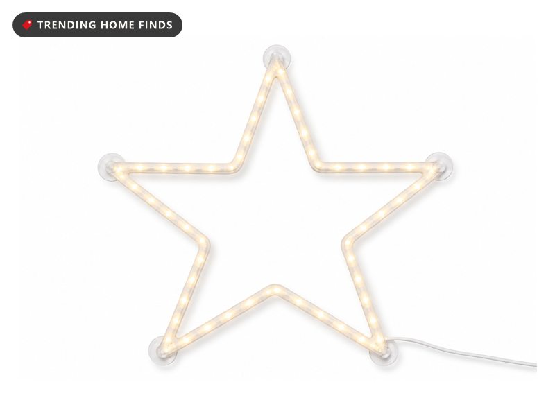 A flat five point star outline of white tubing with warm white LEDs along its edges and small suction cups at its points.