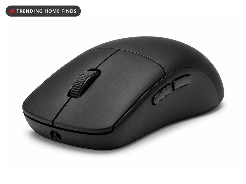 A black low profile wireless gaming mouse with a plain scroll wheel and two side buttons.