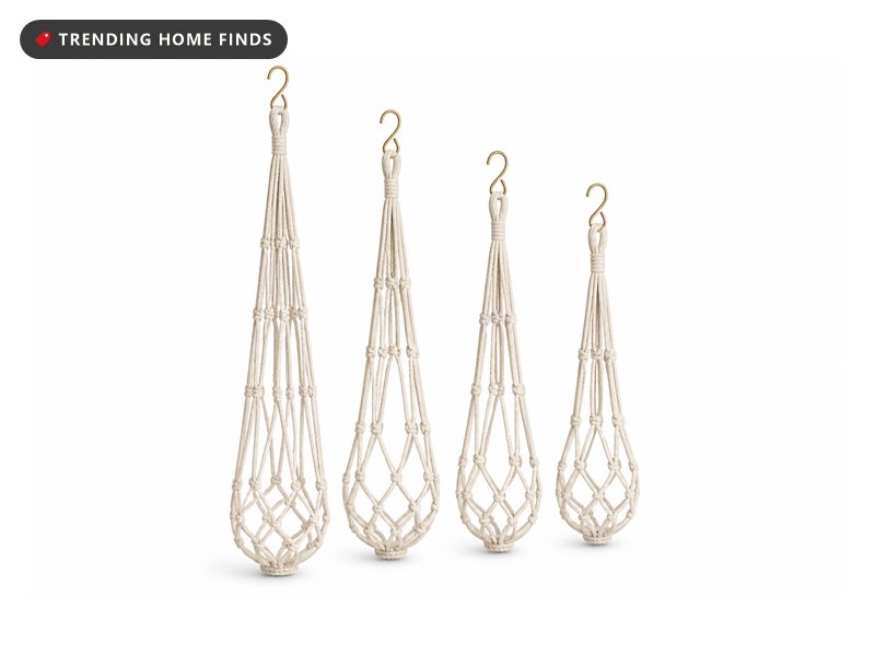 Four ivory cotton macrame plant hangers in different lengths, each with a knotted net and a top loop.