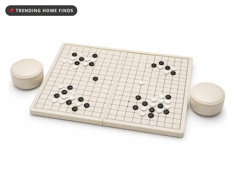 A folding magnetic Go board with a printed 19 by 19 grid, black and white stones on the lines and two lidded bowls.