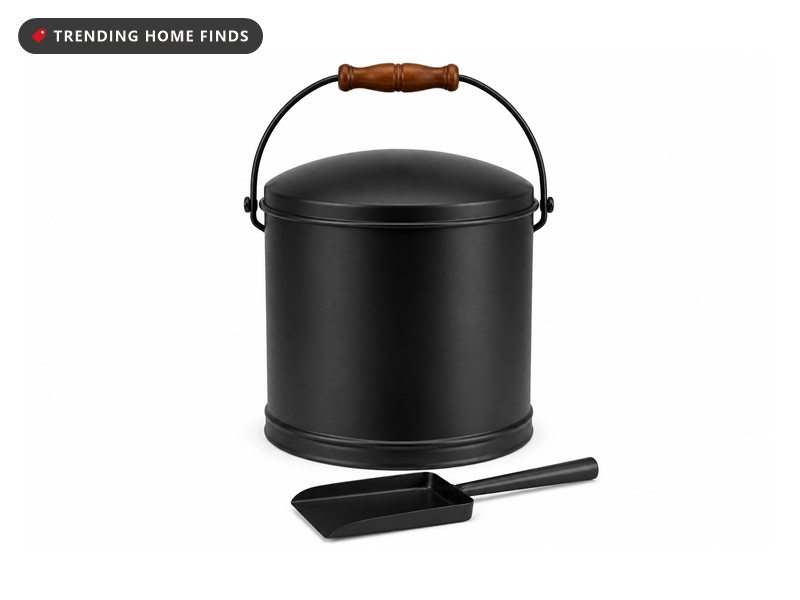 A black metal ash bucket with a domed lid, a bail handle and a small shovel.