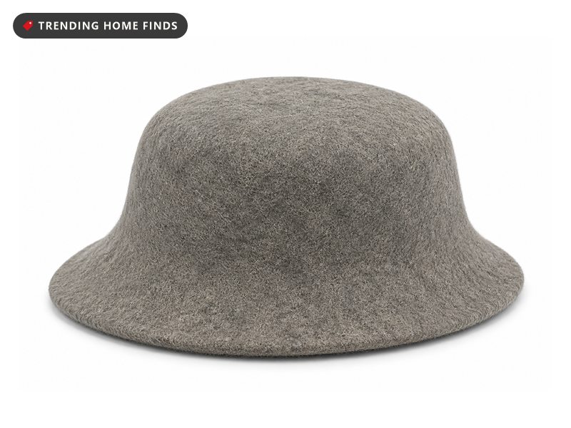 A soft gray natural wool bucket hat with a round crown and a short sloping brim.