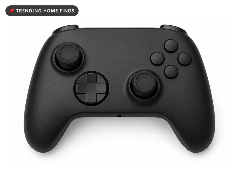 A matte black wireless pro controller with two thumbsticks, a directional pad and four round face buttons.