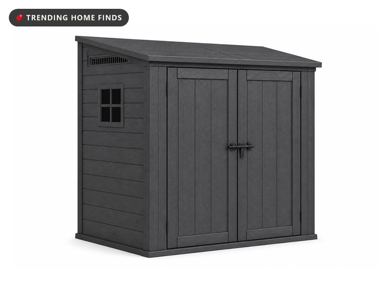 A small graphite gray resin shed with a wood grain texture, a sloped roof, a side window and double doors.