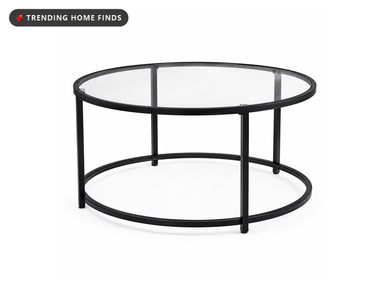 Round two-tier coffee table with a clear tempered glass top and a slim matte black metal frame