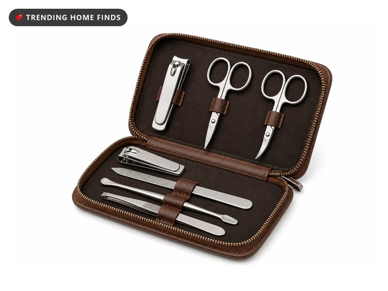An open brown leather manicure case with thirteen polished stainless steel tools held in elastic loops.