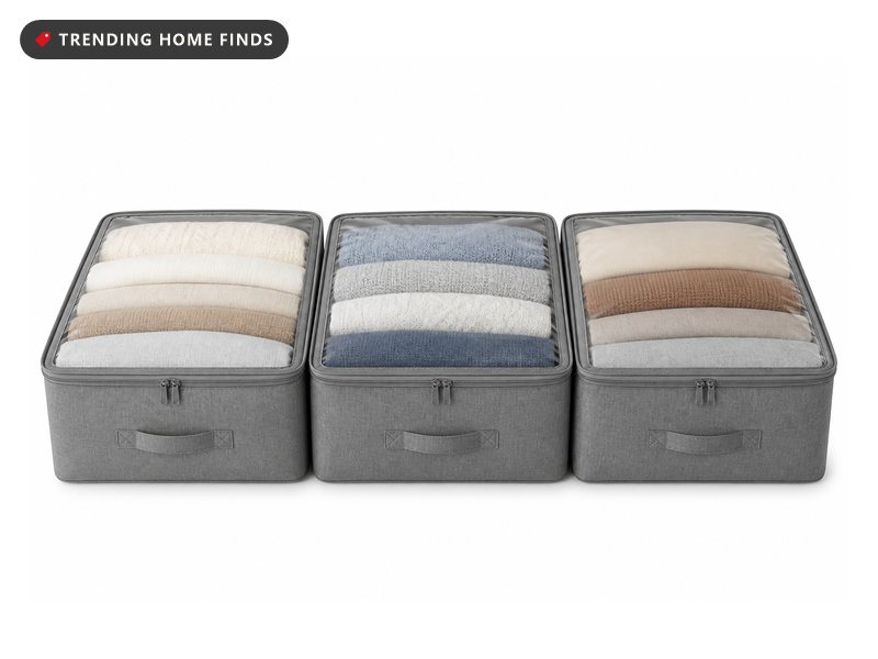 Three gray fabric underbed storage bags with zippered lids, clear top panels and reinforced front handles.