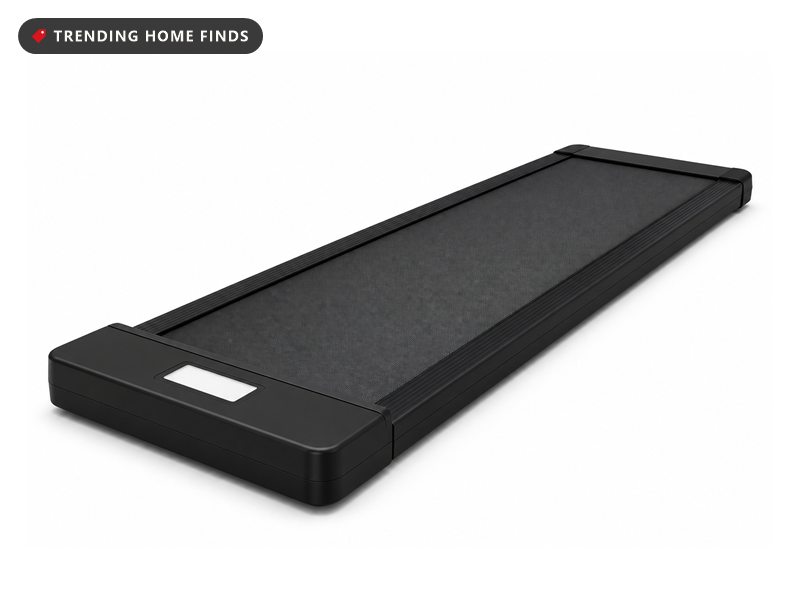 A slim black walking pad with a gray belt between two low side rails.