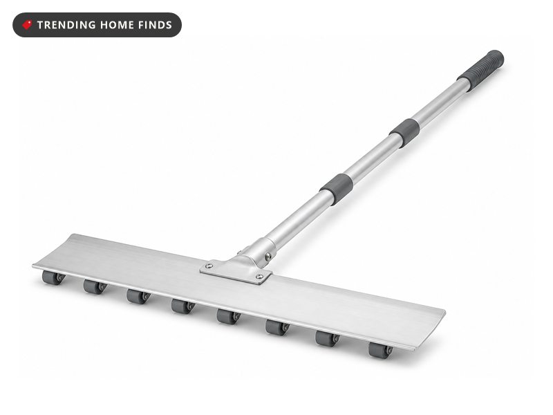 A roof snow rake with a wide flat blade, plastic rollers on the underside and a sectioned aluminum pole.