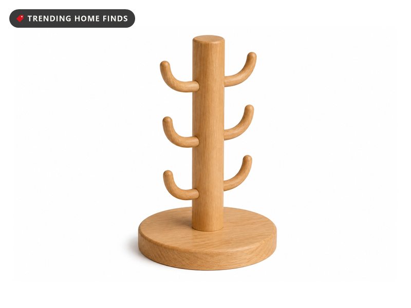 A natural wood mug tree with six curved hooks on an upright post rising from a thick round base.